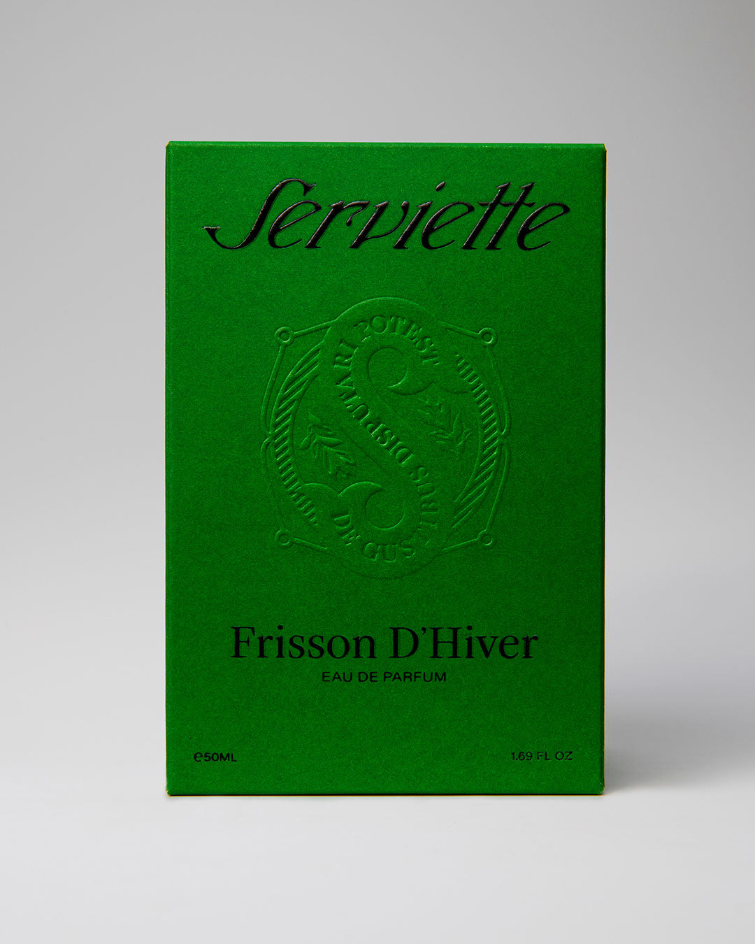Green packaging of 'Serviette Frisson D'Hiver' perfume with branding on a gray background