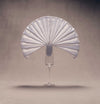 Serviette fanned out in champagne flute