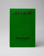 Green perfume bottle packaging with 'Sour Diesel' branding on a gray background